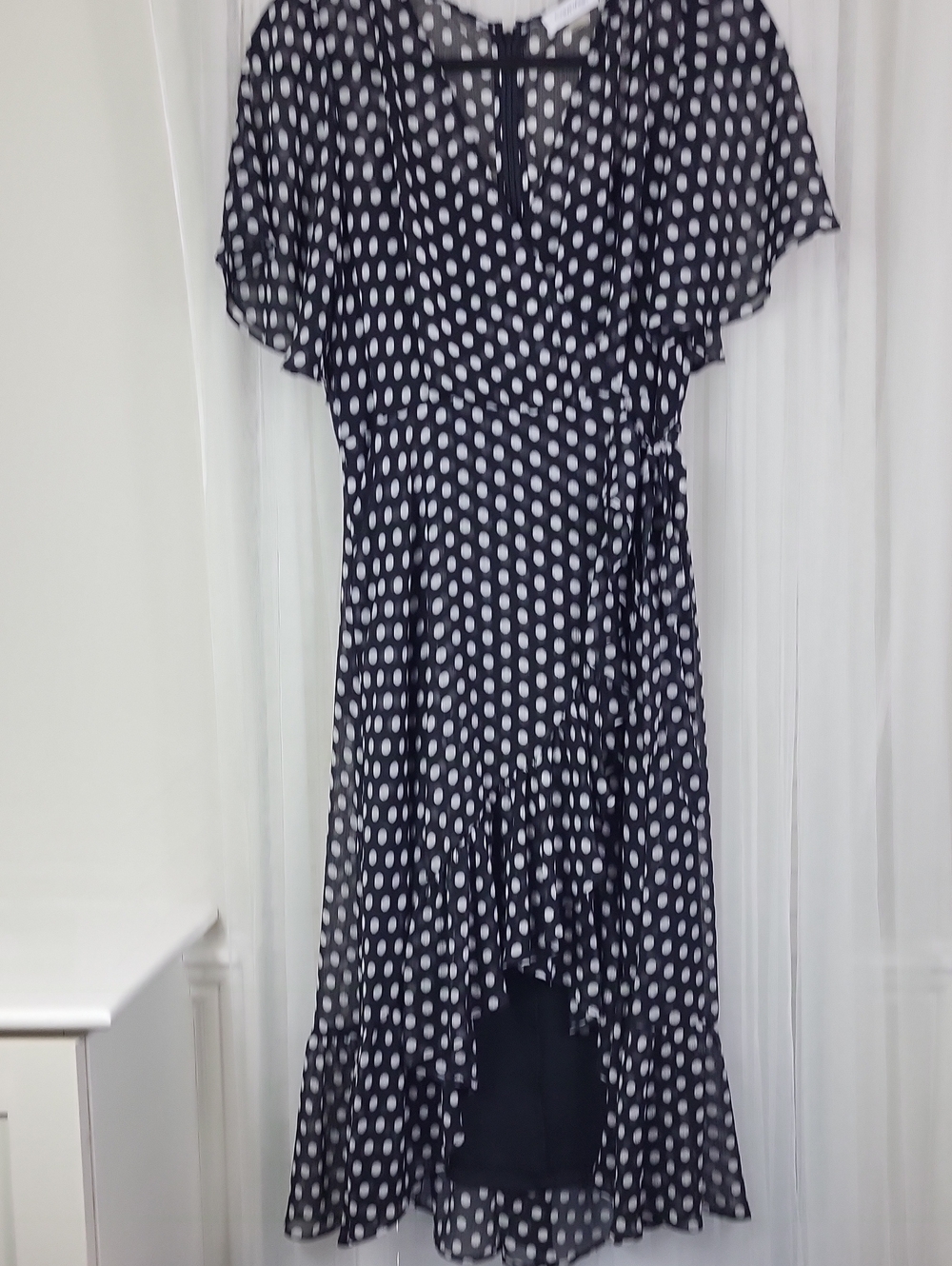Calvin Klein Polka Dot Black and White Wrap Dress. Size 6